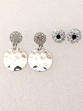 2 pairs of silver tone earrings